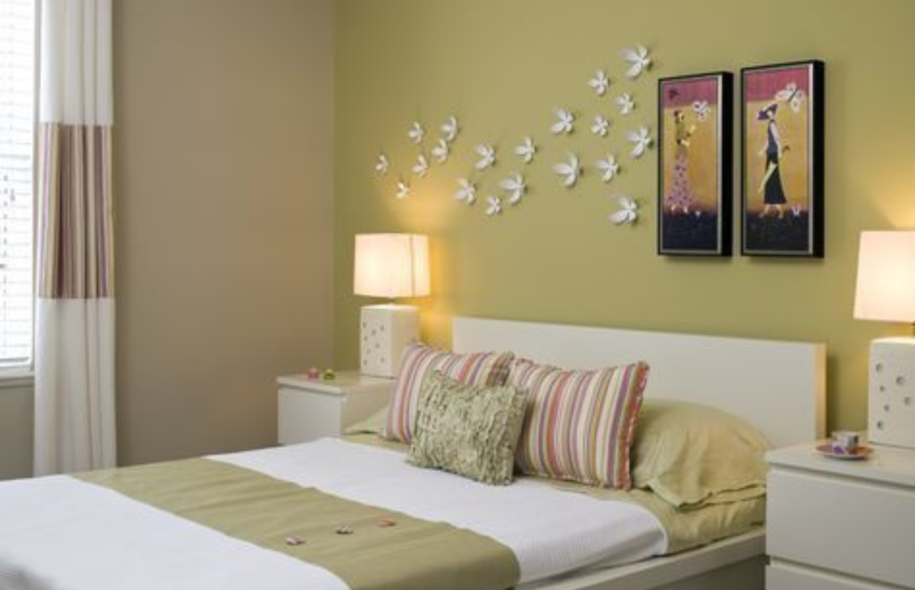 Bedroom with green wall colour with modern Lighting
