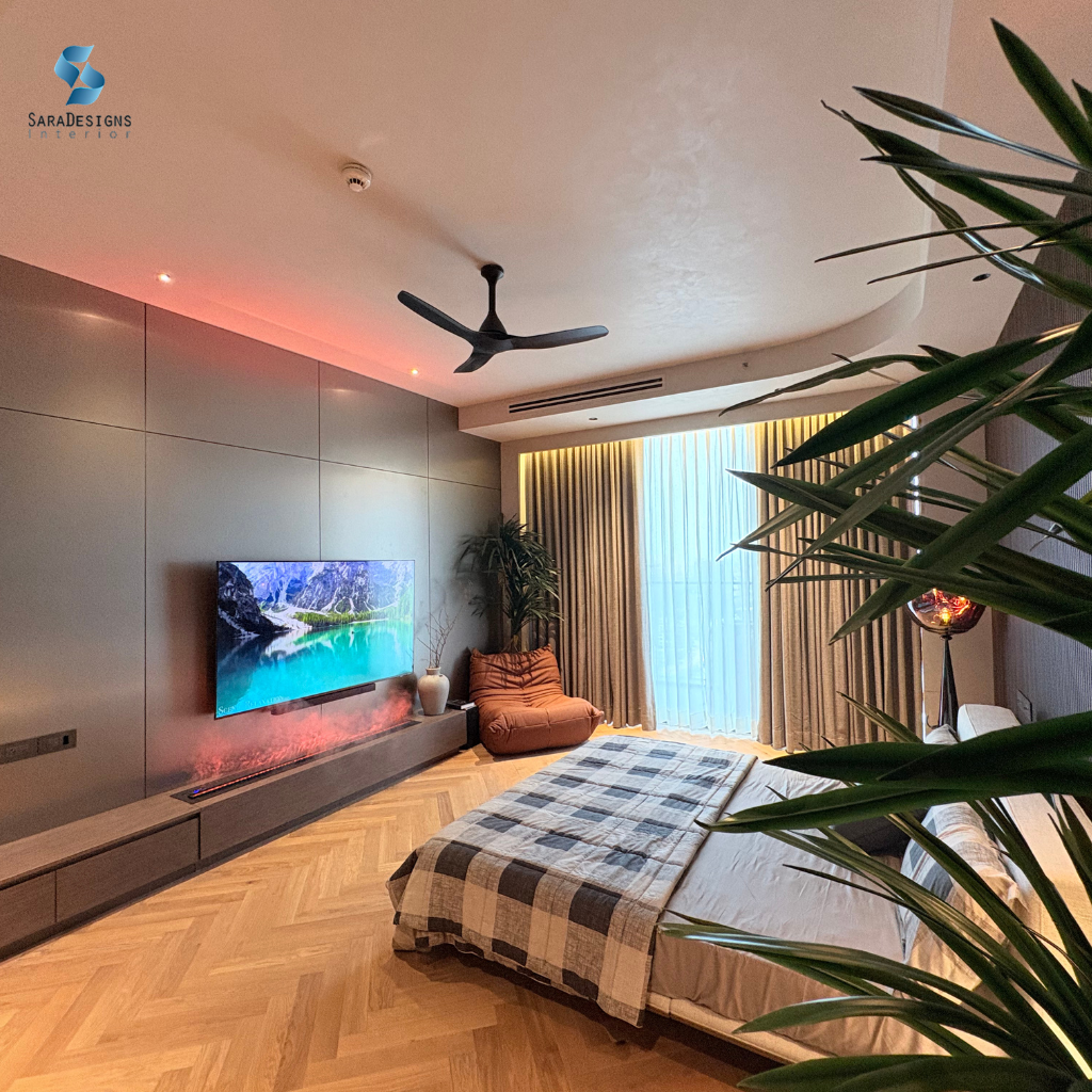 Master Bedroom Interior Designs with low height bed and Fire place in TV unit at Trump Tower Gurgaon